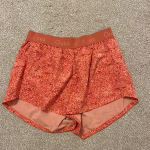 Orange Outdoor Voices shorts